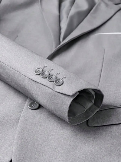 3-delige herenpakset met lange mouwen, effenkleurig jasje, mouwloos topje met knoopjes aan de voorkant en broek.