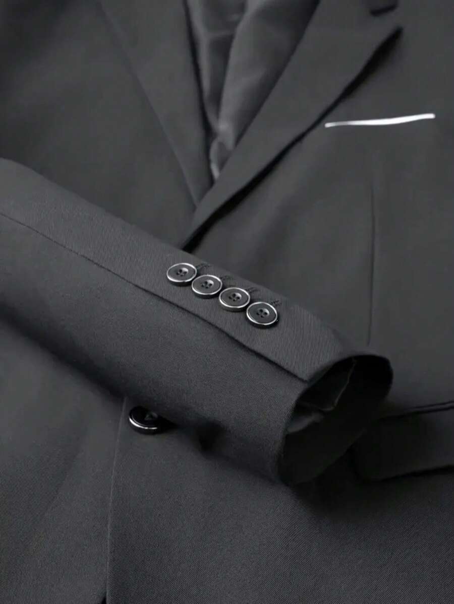 3-delige herenpakset met lange mouwen, effenkleurig jasje, mouwloos topje met knoopjes aan de voorkant en broek.